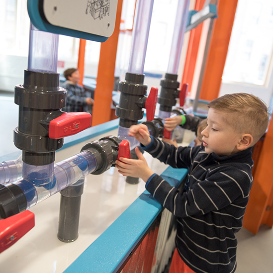 boy playing with Valve play